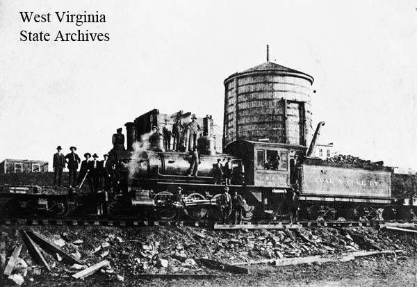 Coal and Coke engine and crew at water tank