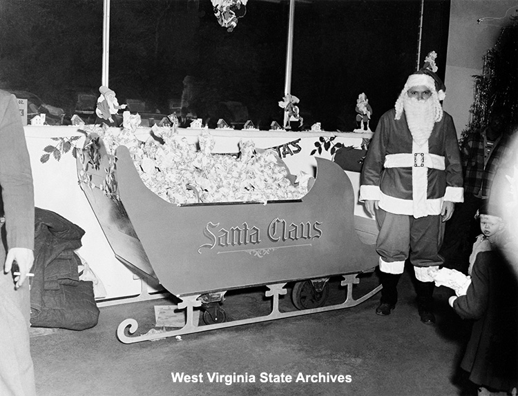 Christmas party for children, Coalwood Store, 1950 December 23. Carol DeHaven Collection, West Virginia State Archives (162807)