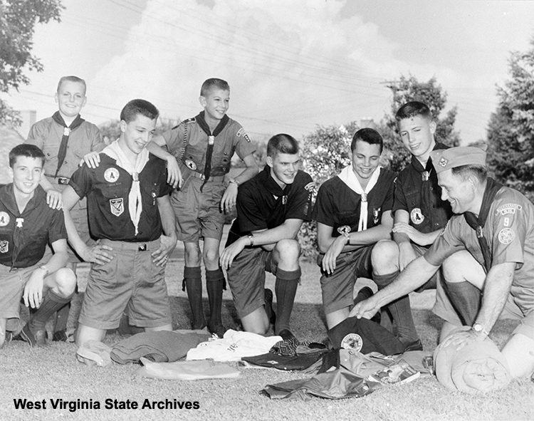 Boy Scout troop  in  Buckhannon, 1958: John Curry, Ron Culp, Bartley Waddell, Sam Feola, Dick Ralston, John Crites, Bob Reger, scoutmaster Percy Karickhoff.  Richard H. Ralston Sr., West Virginia State Archives (327313)