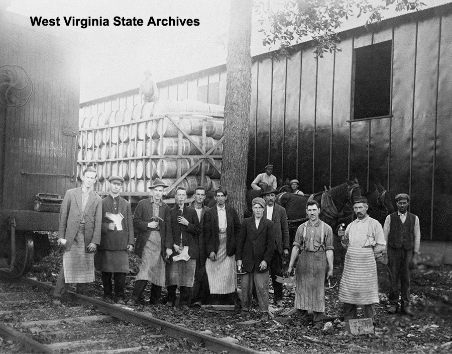 Inwood Cooperage Company, barrel wagon and men. Ed Markle in white shirt and apron, front, next to end; John F. Staub next to tree; and Pete Washington on horse. Donna Shirley Collection, West Virginia State Archives (085512)
