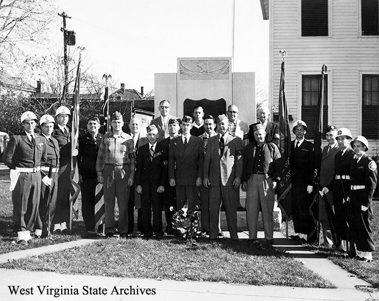 Veterans of Foreign Wars, color guard, Buckhannon, May 30, 1956. L-R: ? Mackey, 5th from left Dick Young, 2nd from right, Ken R. Thornhill. Pam Butcher Collection, West Virginia State Archives (285305)