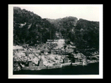 Power house site during the hydroelectric power construction on the New River. Continuation of power house excavation. Temporary concrete cofferdam is shown in foreground with forms partially stripped. New-Kanawha Power Company, Hawks Nest - Gauley Junction Development No. 135.