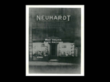 View of the exterior of Neuhardt Men's Clothing Store on 12th Street in Wheeling. Sign over doorway: B. J. Neuhardt successor to C. S. Noble.