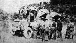 Members of the citizens' army unloading supplies and equipment from service trucks on the front.
Huntington Advertiser, 4 September 1921