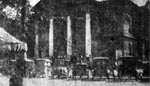 Logan Courthouse, with automobiles pressed into service to carry men and equipment between the
city and battle line. Huntington Advertiser, 4 September 1921