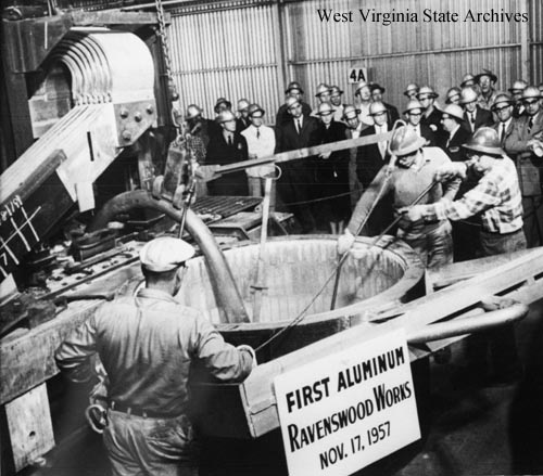Workers at Kaiser Aluminum producing first
aluminum