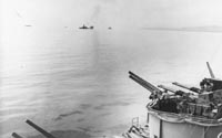 Australian cruiser hit by Japanese kamikaze, as seen from the USS West Virginia