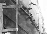 Scraping barnacles from the USS West Virginia