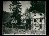 Construction of a house in Wolf Pen hollow, looking northeast. (For view taken a few days earlier, <a href="photodetail.aspx?Id=26">click here</a>.  For later view, <a href="photodetail.aspx?Id=31">click here</a>. This picture is also found in the DeHaven Collection, Roll 1596 09.