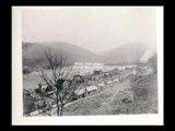 View of Glen Ferris showing the Electro Metallurgical Company plant, K&M Railroad station, Glen Ferris Inn, and Kanawha River.