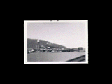 View across the log pond of the Meadow River Lumber Company mill at Rainelle. From small red photo album.