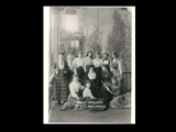 Group of students and one Sister (Mary Xavier Slater) on the porch at Mount de Chantal Visitation Academy in Wheeling. Students: Mary Dorsey, Mollie Kirk, Blance Wells, Anna Gentry, Stannie Gannon, Marie Derricson, Jennie Schallcross, Louisa Flack, Helen Stone, Nora O'Brien, Bertha Loos.