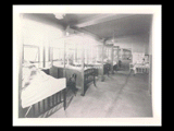 Interior view of Ohio Valley Hospital showing the children's ward with beds.
