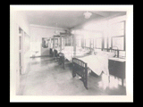Interior view of Ohio Valley Hospital showing the children's ward with beds.