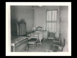 Interior view of Ohio Valley Hospital showing a private room in the Pediatric Division with bed, chairs, and other furniture.