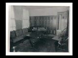 Interior view of Ohio Valley Hospital showing the surgeons dressing room with chairs, table, couch, and lockers.