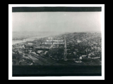 Part of panoramic view from the hillside of Wheeling. View includes bridge and Ohio River. Middle right cirkut.