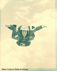 Jamie makes a parachute jump. Barton Family Collection (Ph2018-007), West Virginia State Archives
