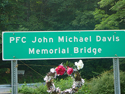Sign designating the bridge named for Pfc. John Michael Davis. Find A Grave photo courtesy Treva Brown 
Simpson
