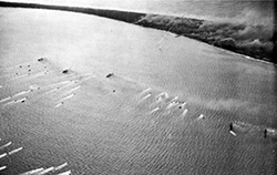 Landing craft heading for Eniwetok Island on 19 February 1944. U.S. Army [public domain] photo in: Philip A. Crowl and Edmund G. Love: <i>United States Army in World War II: The War in the Pacific - Seizure of the Gilberts and Marshalls</i>.