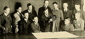 The Lens Club at West Virginia Wesleyan College, pictured in the 1939 yearbook. Robert Gregg is standing, far right.