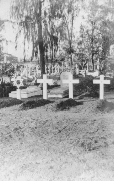 Initial gravesite of Homer Hash at Dakar. The crosses in front mark the
graves of Hash and his fellow crewmen.