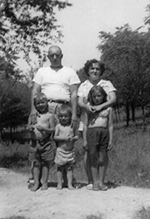 Alan (on the left) with his parents, his brother Roger and sister Sandra