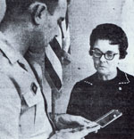 Mother receiving medal