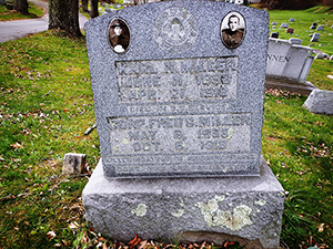 The headstone for Karl and Fred Miller in Woodlawn Cemetery includes photos of both men but is showing the deterioration caused by the elements. Courtesy Cynthia Mullens