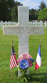In Epinal American Cemetery, a cross denotes the grave of Sgt. Woodrow W. Smith. <i>Find A Grave</i> photo courtesy Dwight Anderson