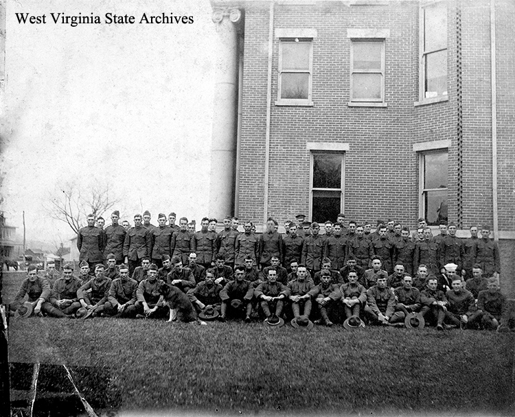 WWI soldiers at the corner of the Hardy County courthouse, Moorefield, November 11, 1919. C.B. Chipley Collection, West Virginia State Archives (089502)