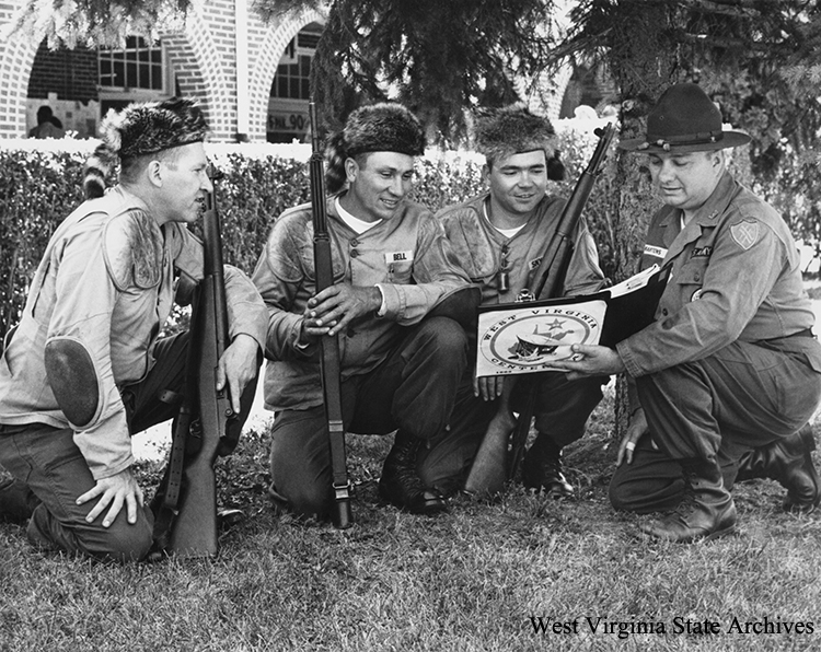 Power Rifle Tournament at Camp Dawson, September 28-29, 1963. L-R Col. William. R. Gentry, Sgt. Ronald F Bell, Sgt. Melvin E. Snyder and Major Robert E Martens. Archives Collection, West Virginia State Archives (343813)