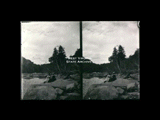 Two women (Minnie and Alice) sitting on a rock along Meadow River. Stereo.