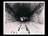 View into tunnel during the hydroelectric power construction on the New River. View shows invert concreted to 31 foot diameter. Camera at Station 43 + 50. New-Kanawha Power Company, Hawks Nest - Gauley Junction Development No. 318.