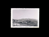 Distance view of the Meadow River Lumber Company mill at Rainelle in winter. From small red photo album.