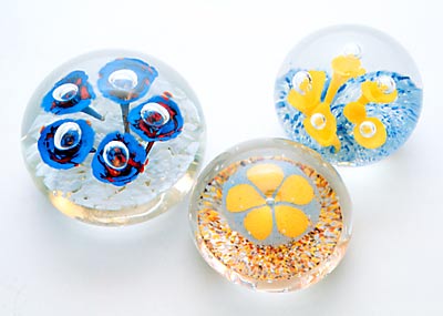 Paperweights by Tommy Goldsmith, Fred Woofter, and Harold Riffle