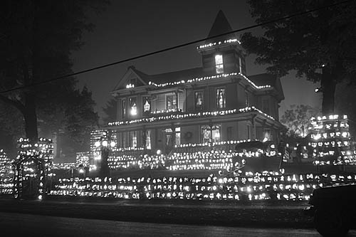 pumpkin house lit up at night
