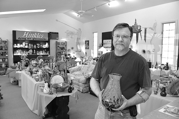 Glass artist Ron Hinkle in his gallery in Upshur County