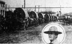 Supply wagons carrying food and ammunition followed close in the wake of the troops up Coal River
toward the firing line on the Boone-Logan border. Colonel Anderson, in command of the troops at
Camp Dix, is shown in the insert. Charleston Gazette, 6 September 1921 