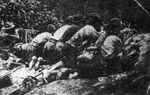 Scene of actual fighting at Blair Mountain, showing armed Logan County deputies repulsing the attack
of miners swaming in the dense thickets hundreds of feet in their front. Charleston Gazette, 10
September 1921