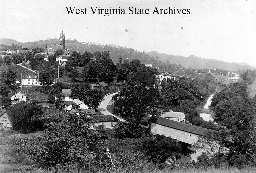 View of West Union with covered bridge in right foreground, circa 1900s. Dale Boyce Collection, West Virginia State Archives (264109)