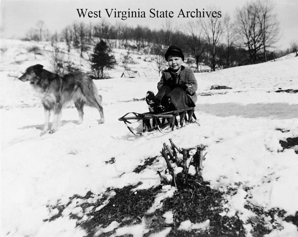 Glenn Brown on sled, circa 1947. Reberta Brown Hall Collection, West Virginia State Archives (319214)