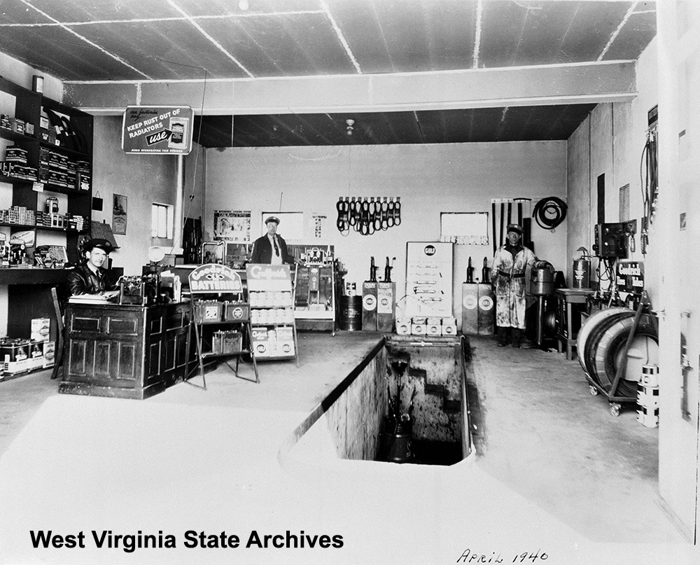 Scott's Service Station interior, Tennerton, April 1940. Harold T. Scott, left; Ford Scott, center. Brent Scott Collection, West Virginia State Archives (135515)