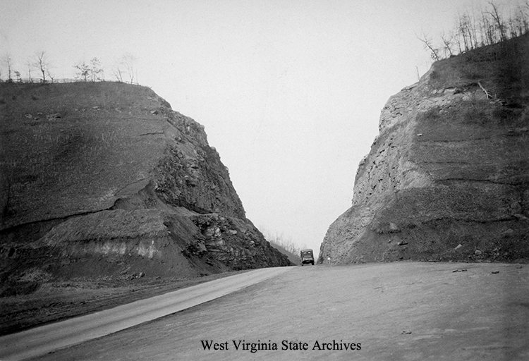 Premier Cut. Largest highway cut in West Virginia, 165 feet deep, three miles from Welch. Civilian Conservation Corps Collection, West Virginia State Archives (326107)