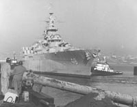 USS West Virginia being towed to Bremerton