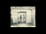 Clipping of elevator and man trip station at bottom of man shaft before explosion. Two men in elevator.