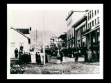 Monongah trying to identify the dead. Large group of people in the street.