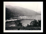 Reef in proposed tailrace below Gauley Junction Bridge during the hydroelectric power construction on the New River. View from the Midland Trail above the bridge. Railroad track in the foreground. New-Kanawha Power Company, Hawks Nest - Gauley Junction Development No. 15.