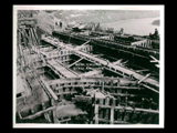 Tunnel intake during the hydroelectric power construction on the New River. View shows intake roof slab and beams concreted. This section is completed except for the concrete slab on front portion and concrete surrounding the gate section. New-Kanawha Power Company, Hawks Nest - Gauley Junction Development No. 339.