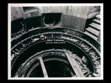 Power house during the hydroelectric power construction on the New River. Interior of wheel pit showing draft tube liner, stay ring and pit liner. Recesses are for governor operating cylinders and oil pumps. New-Kanawha Power Company, Hawks Nest - Gauley Junction Development No. 345.